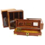 Three Lapaz mahogany cigar cases, 32cm W and a mahogany and brass humidor.