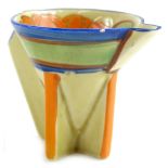A Clarice Cliff Art Deco miniature cream jug, decorated in orange and green within a blue border, on