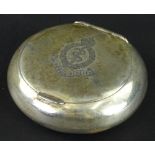 A George V silver pill box, the hinged lid engraved with a crest, Latin motto the mark of the