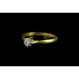 A diamond solitaire ring, with round brilliant cut diamond, approx 0.2cts, in a rub over platinum