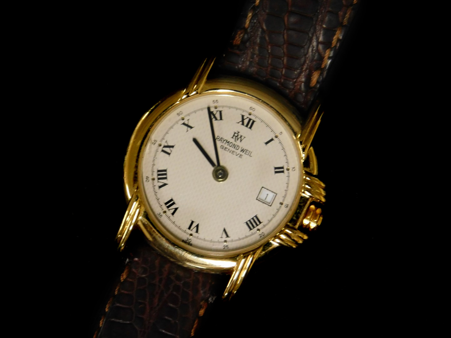 A Raymond Weil ladies wristwatch, with circular watch head, 2.5cm diameter dial, in 18ct gold