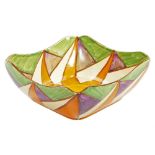 A 1930's Clarice Cliff Bizarre pottery bowl, of shaped square form, polychrome decorated, gilt
