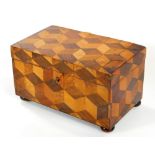 A 19thC parquetry tea caddy, of rectangular form, with sectional interior, 13cm H, 23cm W, 14cm D.