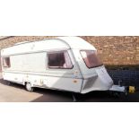 An Ace Viceroy 5 berth caravan, with large awning and porch awning.