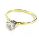 An 18ct gold diamond solitaire ring, with old cut diamond, in claw setting, approx 0.74cts, in