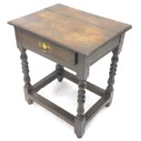 An oak side table, rectangular top raised above a frieze drawer, on baluster barleytwist legs