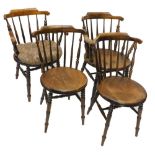 A set of four late 19thC kitchen Windsor type chairs, each with a shaped back and spindle turned