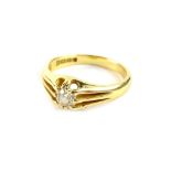 An 18ct gold diamond signet ring, with central round brilliant cut diamond, in three row shoulder