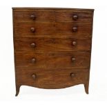 A Regency mahogany bowfront chest, of two short and four long graduated drawers, with oak linings