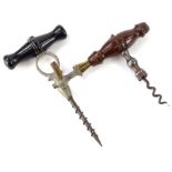 A 19thC hardwood and steel corkscrew with brush and a Holborn champagne screw with ebonsied handle