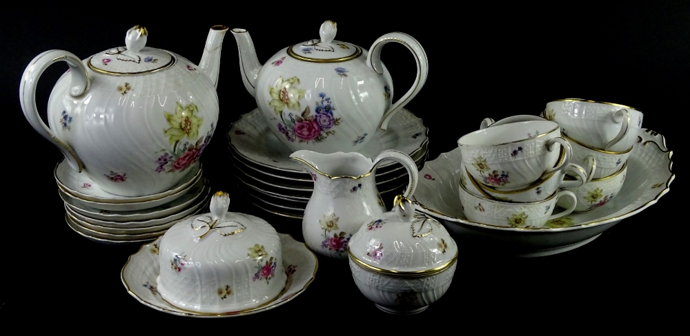 A Hutschenreuther Dresden porcelain part tea service, to include two teapots, muffin dish and cover,