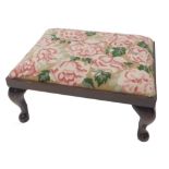 A mahogany foot stool, the woolwork seat decorated with roses, leaves etc., on cabriole legs, 44cm