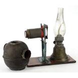 An unusual late 19th/early 20thC small magic lantern, with paraffin lamp attachment, lens etc., on a