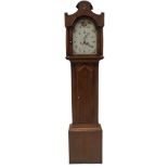 An early 19thC oak longcase clock, with shaped and mahogany crossbanded pillared hood, shaped and