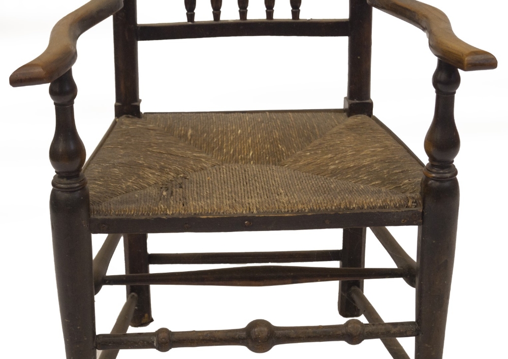 An 18thC elm Lancashire spindle back carver chair, with shaped arms, baluster supports, and turned - Image 3 of 3