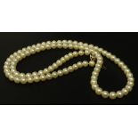 A single strand cultured pearl necklace, the pearls 6mm W, with 9ct gold clasp, 62cm L overall, in