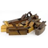 A large quantity of tools, to include various wooden block planes etc.