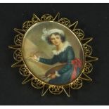 A late 19thC portrait pendant, with scroll sunburst design frame, and central porcelain portrait