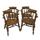 A set of four Victorian smoker's bow chairs, with turn supports, turned legs and double H frame