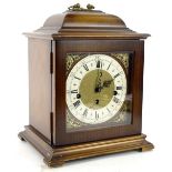 A 20thC mahogany mantel clock, the square dial, Westminster chime on block feet, 30cm H.