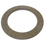 A cast brass traction or steam engine roundel, stamped Marshall Traction Compound, 54cm dia.