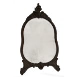 A Victorian mahogany mirror, with cartouche shaped plate, with scroll carved pediment and feet, 97cm