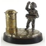 A novelty Victorian silver table lighter, modelled in the form of a young boy, with removable cap,