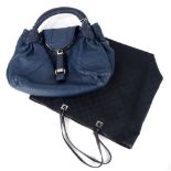 A Fendi leather handbag, in blue and a Gucci tote bag in GG monogram material.