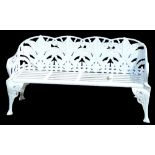 A late cast iron Coalbrookedale style garden bench, decorated with Lily of the Valley and with a