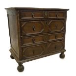 An 18thC and later oak chest, of four drawers, each with moulded decoration and brass petal backed