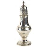 A George III baluster shaped silver sugar castor, with an acorn finial, on a tapering foot, London