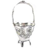 A German silver plated Art Nouveau basket, decorated with flowers, leaves etc., and with a pierced
