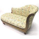 A late 19thC continental rosewood and marquetry chaise lounge, upholstered in floral fabric, on
