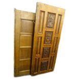 Two oak panelled doors, one carved with flowers etc., 83cm and 87cm W respectively.Provenance: