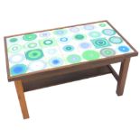 A 1970s/80s Danish style teak coffee table, with a tiled top on square section legs, 79cm W.