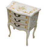 A continental cream painted bedside cabinet, decorated overall with flowers, scrolls etc., the top