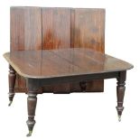 A William IV mahogany extending dining table, the rectangular top with a moulded edge, on turned