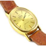An Omega De Ville ladies wristwatch, with oval watch head, and gold coloured dial, (AF)