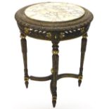 A Continental giltwood gesso occasional table, the circular top with a cream variegated marble