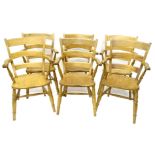 A set of six 20thC Oxford design Windsor armchairs, each with a solid seat and H stretcher.