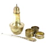 A collection of small silver, to include a sugar castor, button hook and napkin rings, 9oz gross.
