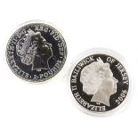 Two silver commemorative coins, a 2007 one ounce of fine silver Britannica and a Bailwick of