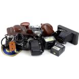 A quantity of cameras, to include Kodak, Retinette, Olympus OM10 with lens etc.