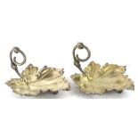 WITHDRAWN PRE SALE BY VENDOR. A pair of silver plated leaf shaped hors d'oeuvre dishes,