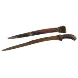 An Eastern dagger with wooden handle, slightly curved blade and painted scabbard, 55cm L.