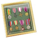 A quantity of mainly Polish and British medals, to include The Poland cross of Merit, The Polish