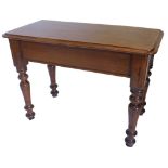 A Victorian pitch pine and mahogany side table, the rectangular top with a moulded edge, on turned