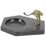 An early 20thC bronze and marble ashtray, modelled in the form of an ostrich on a shaped black base,