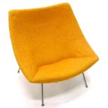 A Scandinavian retro style large tub armchair, upholstered in textured yellow fabric, on tubular