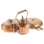 A Victorian copper and brass kettle and cover, an oval bed warmer with brass stopper and another